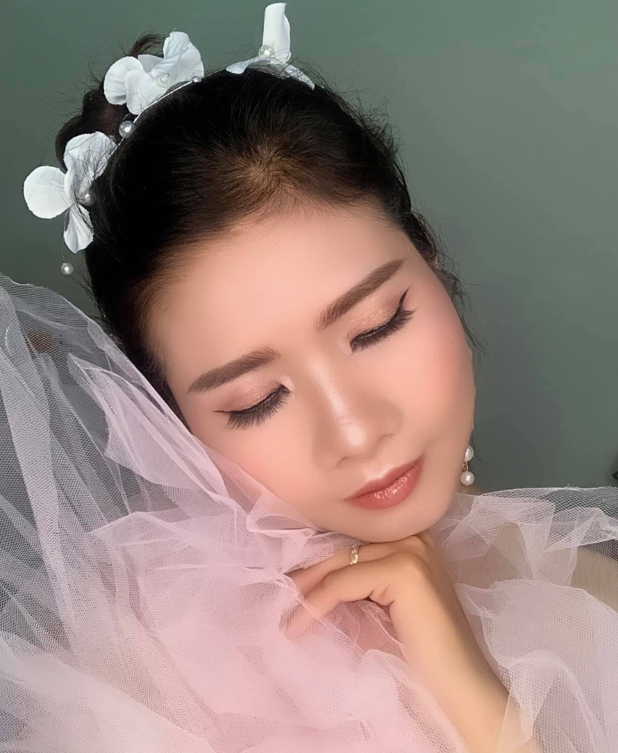 Photoshoot makeup for Hoi An lantern portraits
